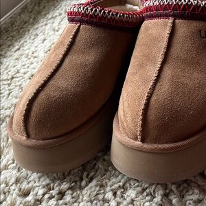UGG Brown Slip-Ons with Red Accents